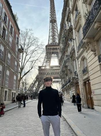 Stephen standing in front of the Eifel tower